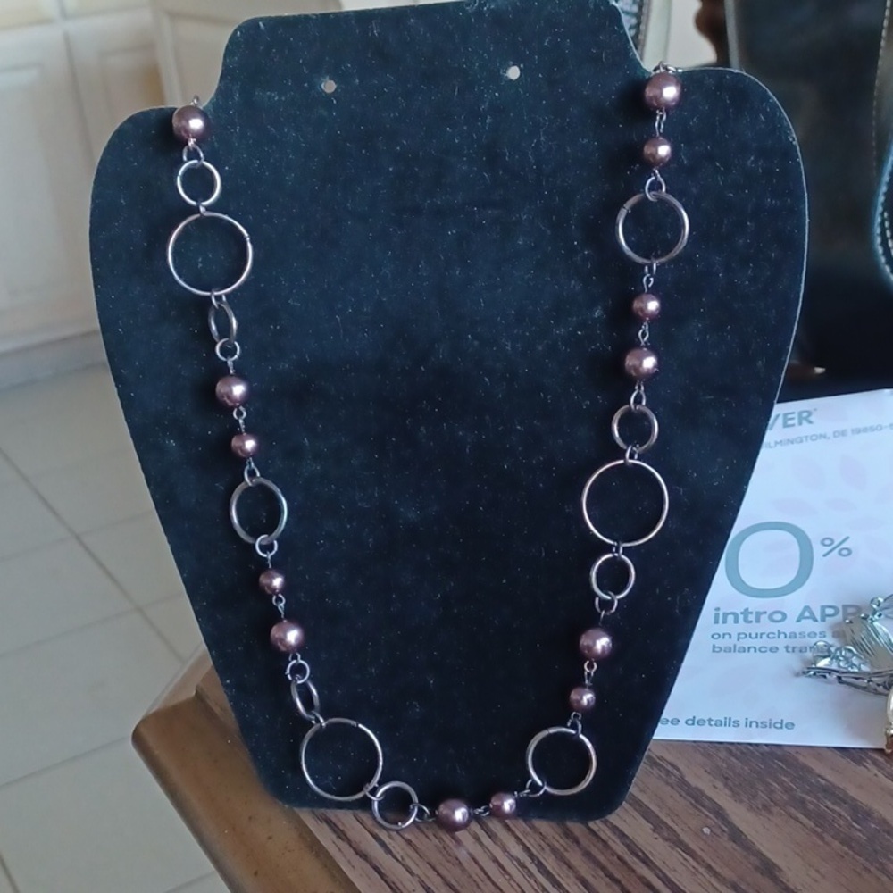Lovely signed Daisy Fuentes Rings and Beads Necklace, 18" long, copper look